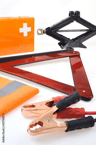 Emergency kit for car - first aid ,jumper cables, triangle