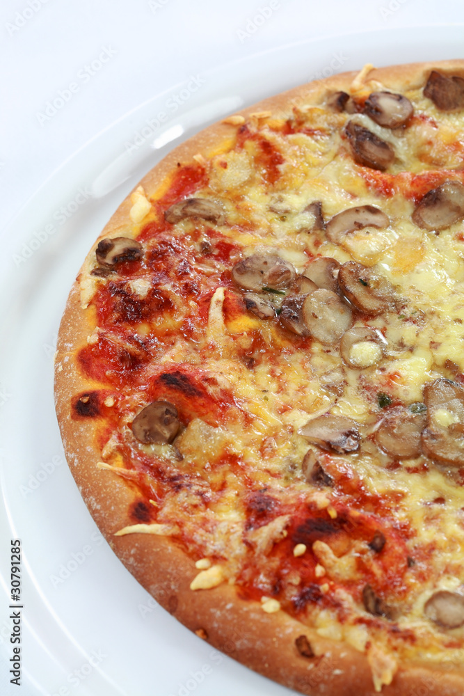 Pepperoni pizza with mushrooms