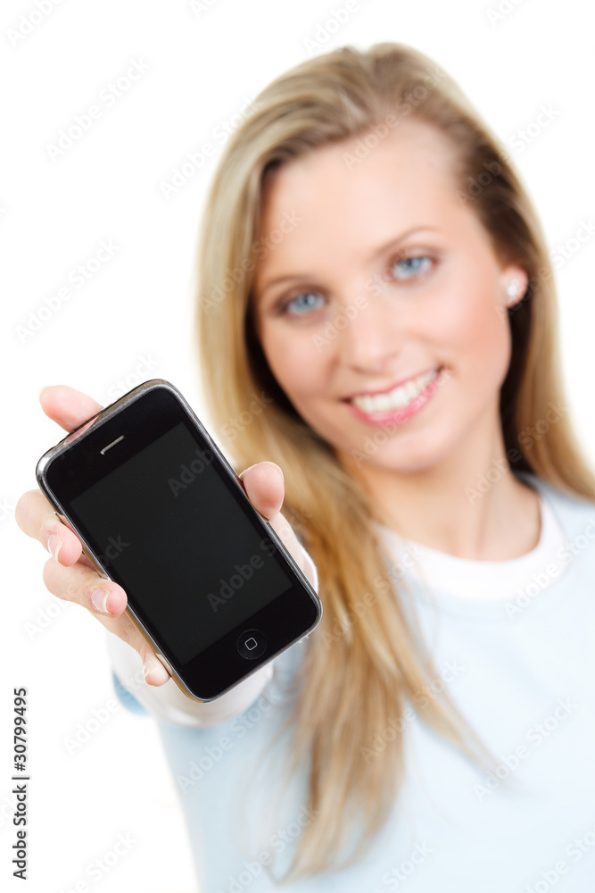frau streckt ihr handy richtung kamera frau streckt ihr handy richtung kamera
