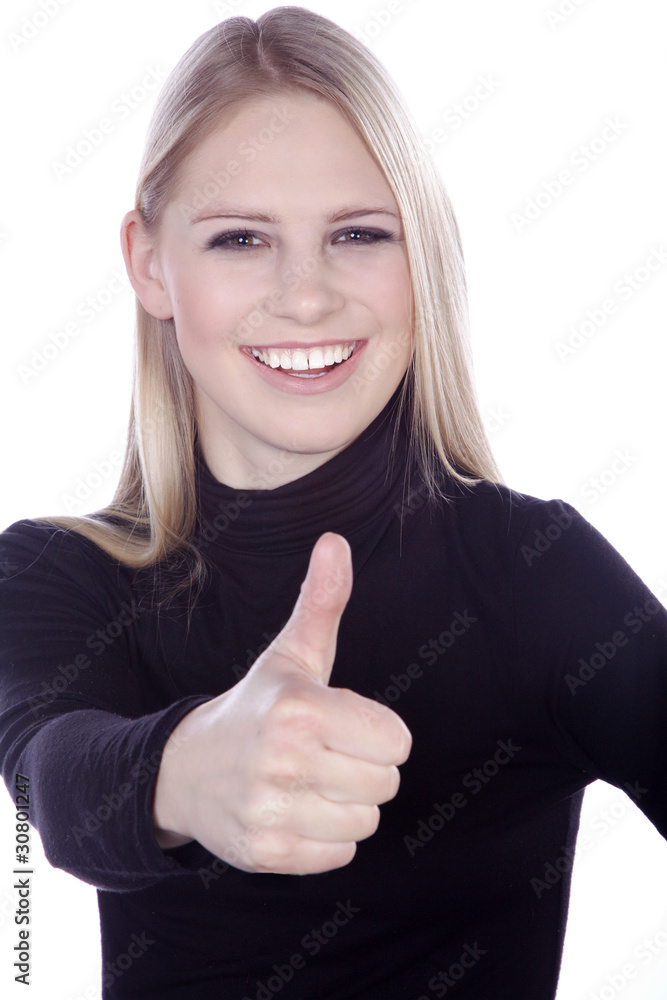 Blonde Model Frau hält lachend Daumen hoch Porträt Blonde Model Frau hält lachend Daumen hoch Porträt