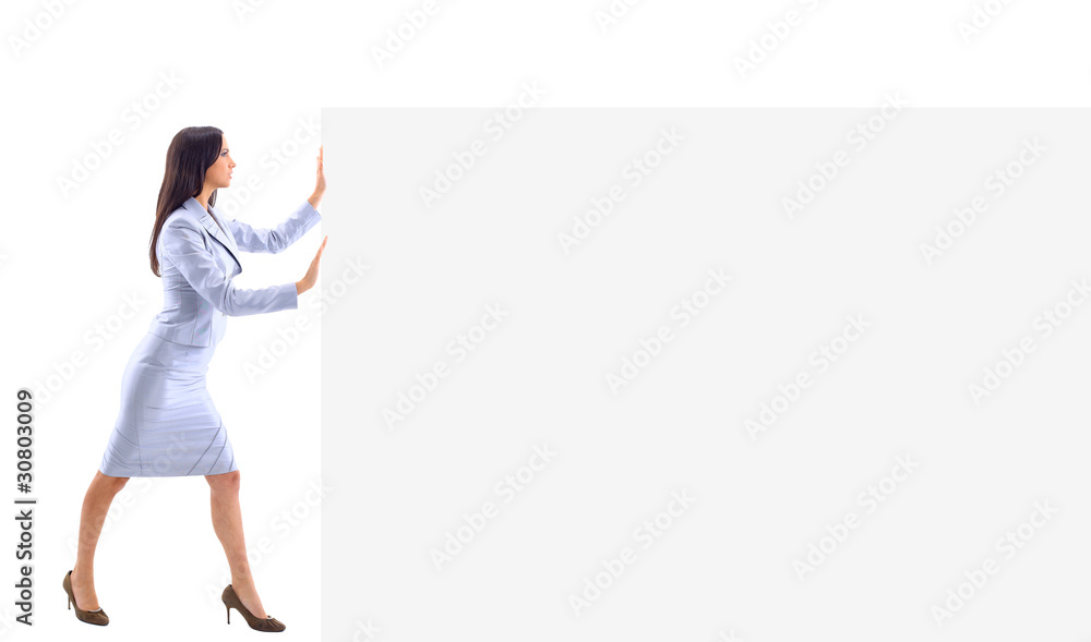 Businesswoman pushing something Businesswoman pushing something