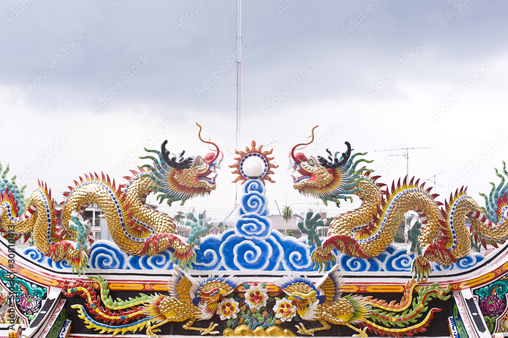 dragon statue on the roof dragon statue on the roof