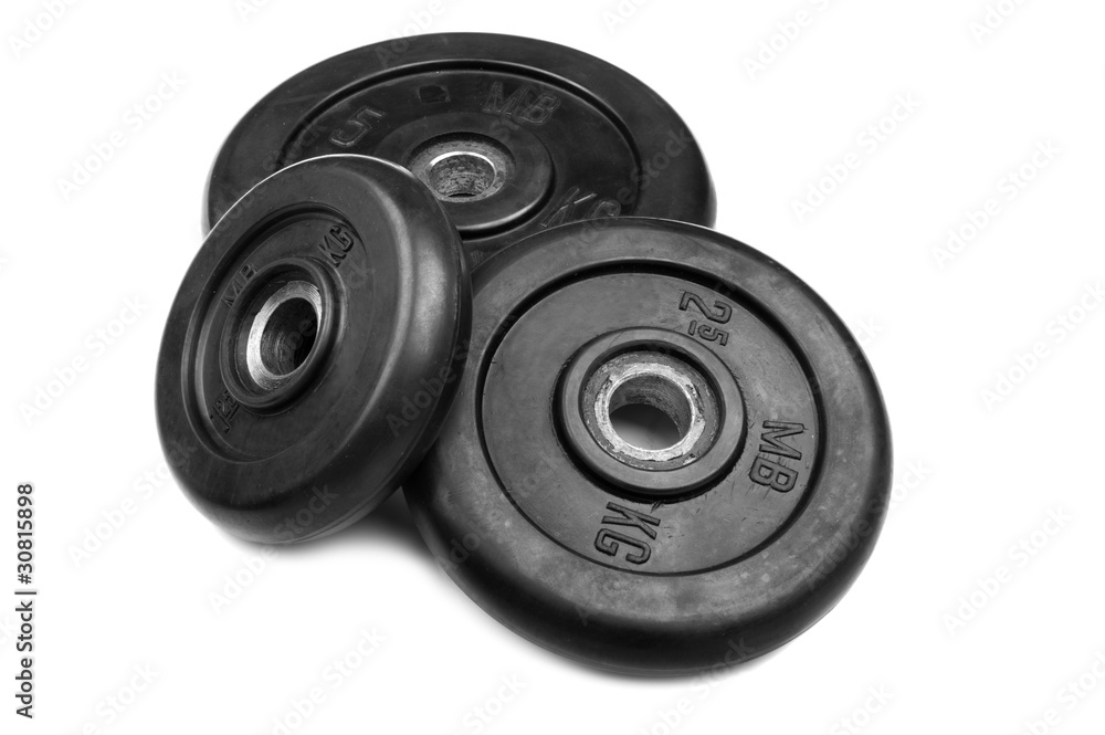 disc dumbbell on white close up disc dumbbell on white close up