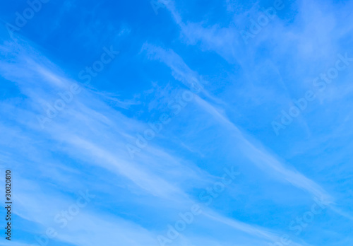 blue sky with pindrift clouds, background