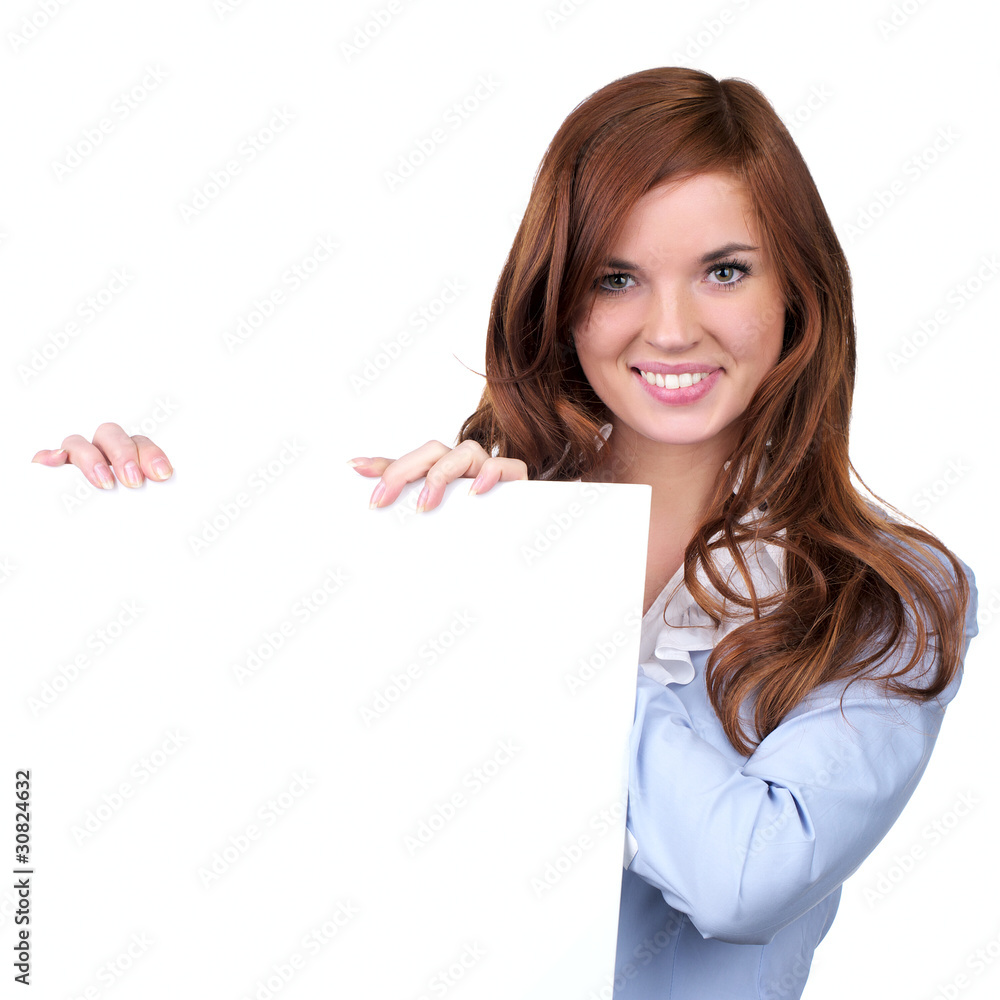 Beautiful young woman holding an empty billboard Beautiful young woman holding an empty billboard