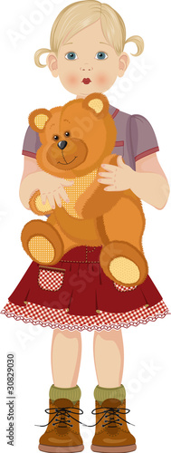 Cute little girl with teddy bear photo