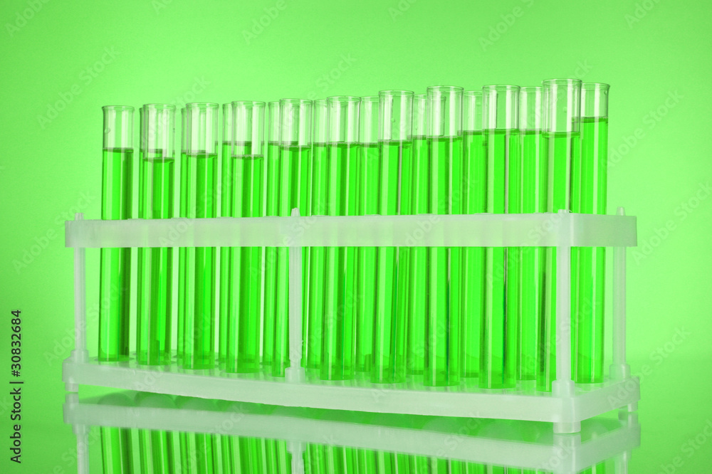 Test-tubes on green background Test-tubes on green background