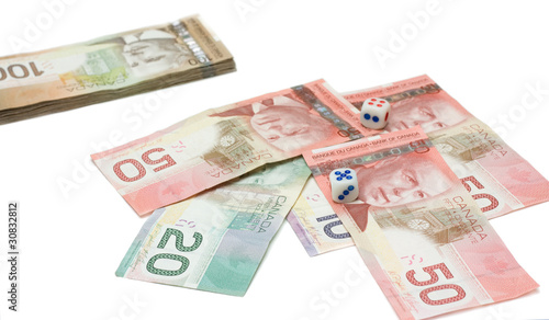 Canadian dollars with dice