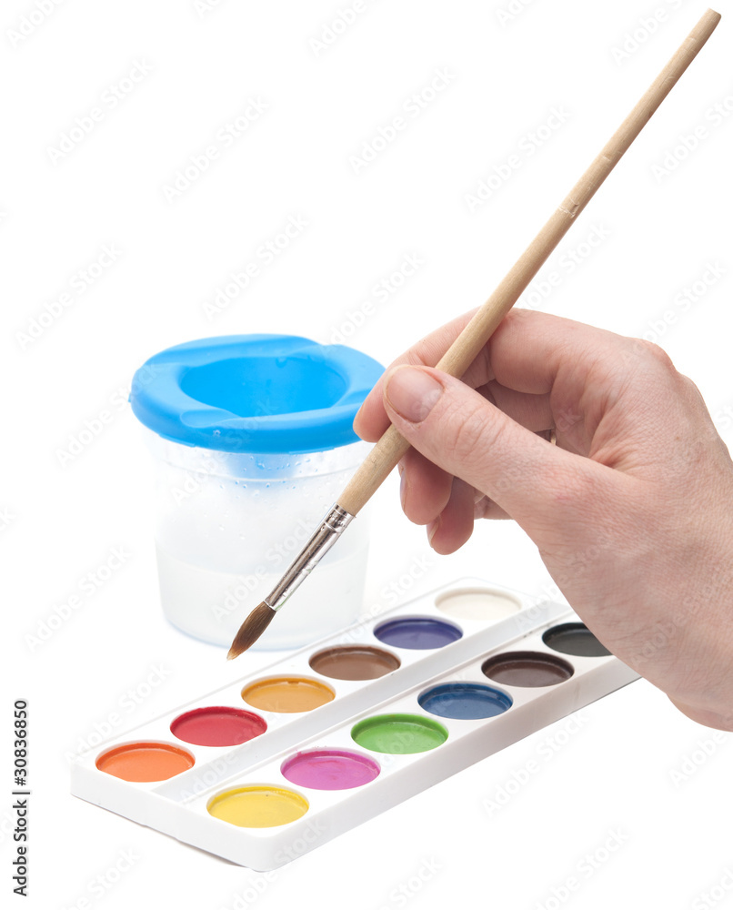 Hand with paintbrush