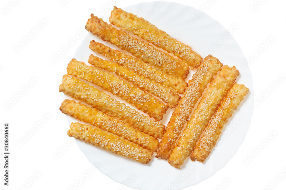 Sweet baking sticks on a white plate Sweet baking sticks on a white plate