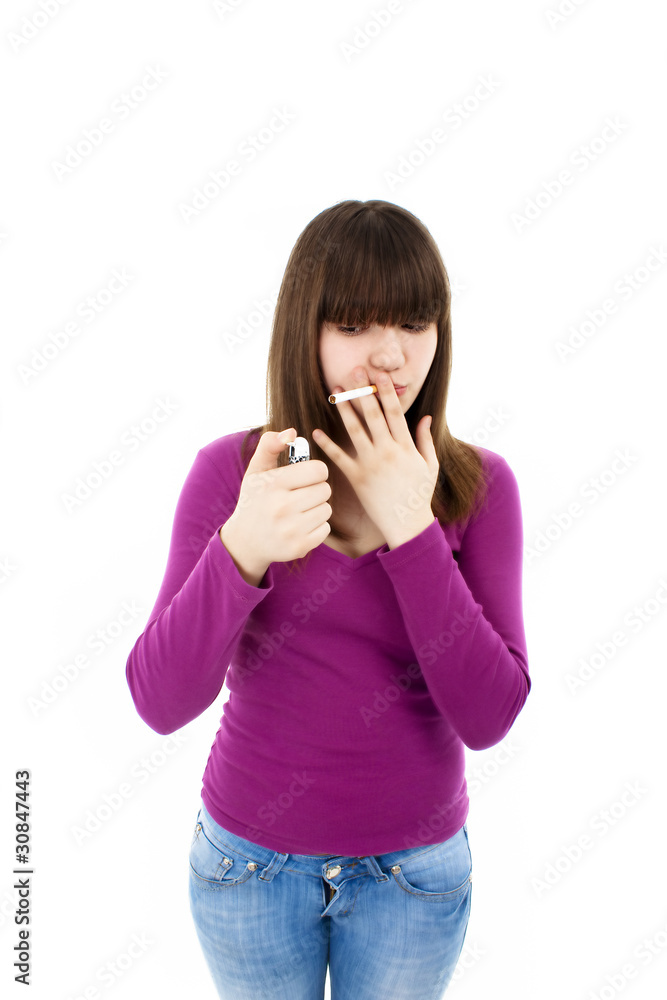 Teenage girl lighting cigarette isolated on white Teenage girl lighting cigarette isolated on white