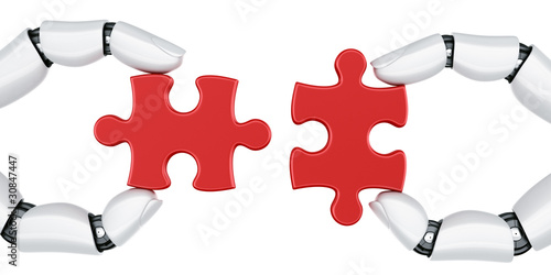 Robot hands with puzzle pieces