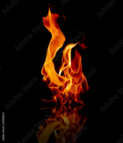 Fire flames reflected in water © Masson