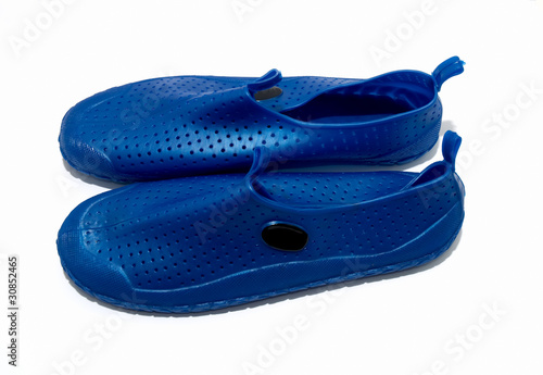 Beach shoes isolated on white background .