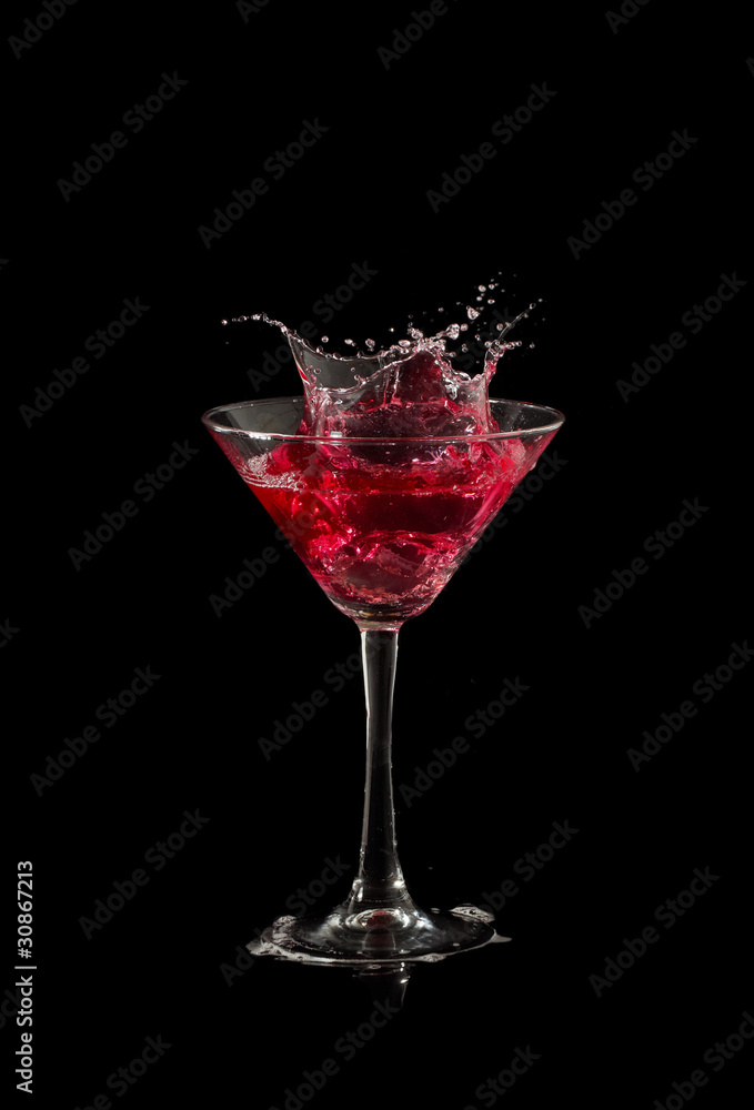 red martini cocktail splashing red martini cocktail splashing