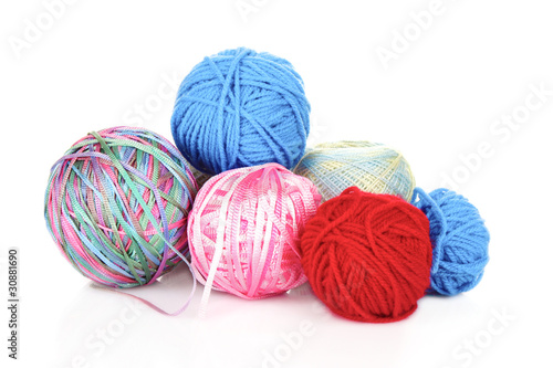 Knitting yarn and knitting needles on white