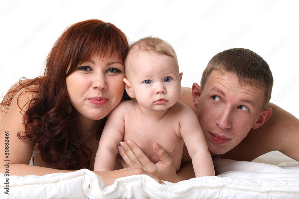 Young smiling family on white background Young smiling family on white background