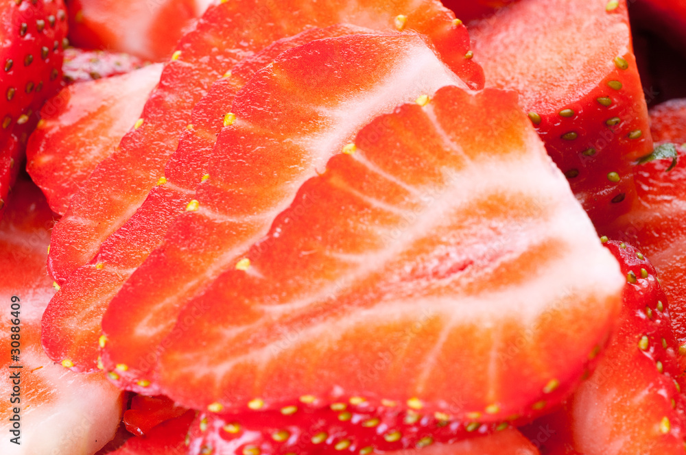Sliced strawberries . Sliced strawberries .