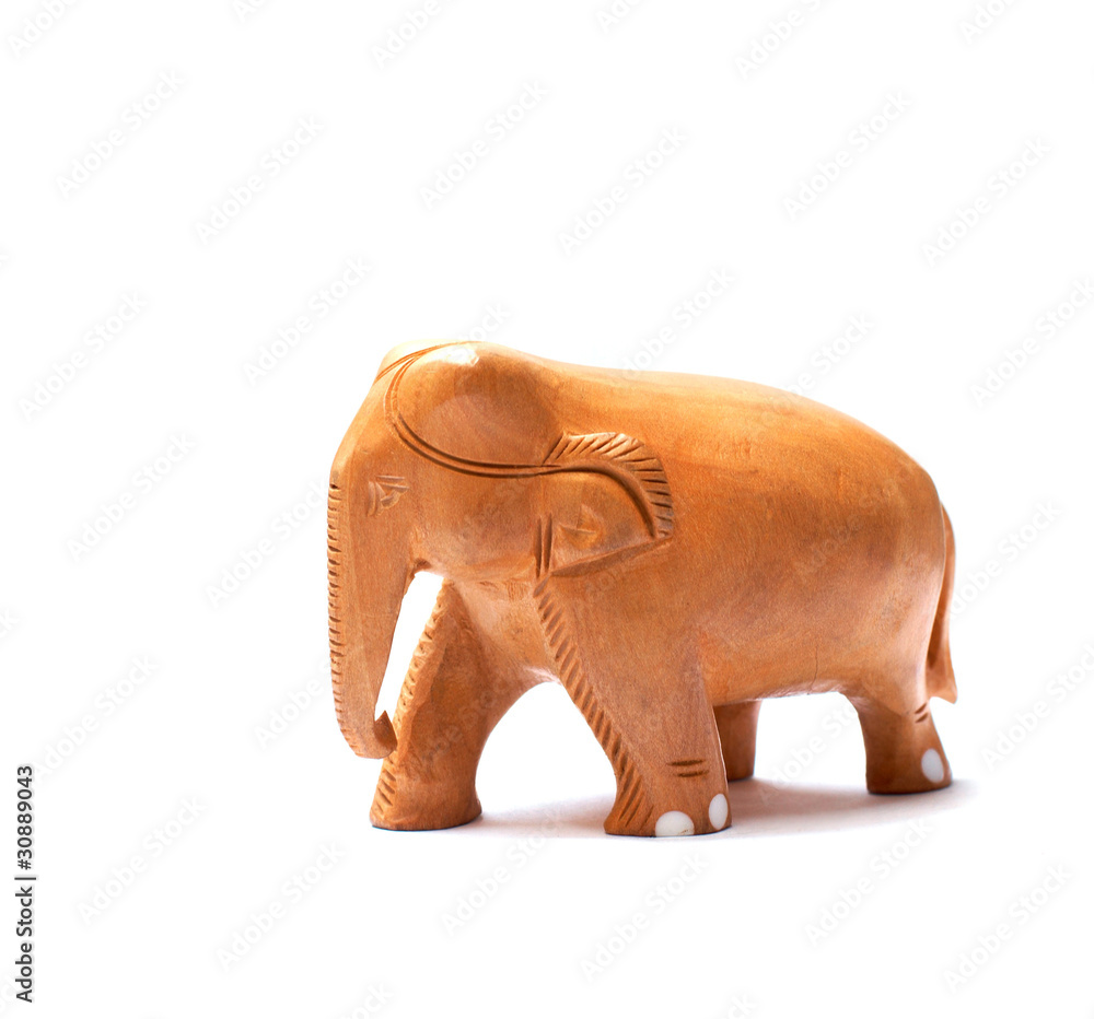 Fototapeta premium Antique Wooden Elephant isolated over white