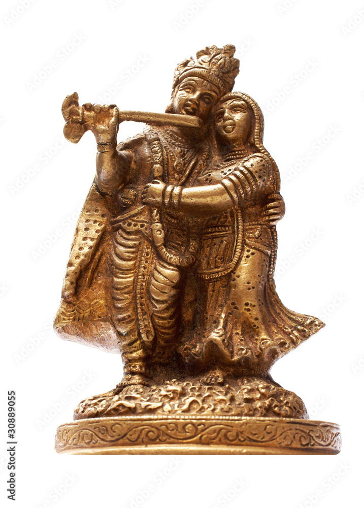Idol of lord Krishna isolated over a white background Idol of lord Krishna isolated over a white background