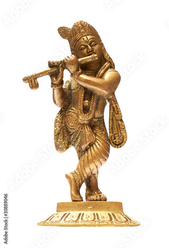 Idol of lord Krishna isolated over a white background