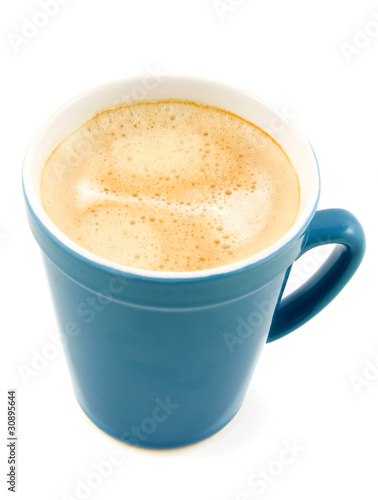 Coffee in blue cup over white background