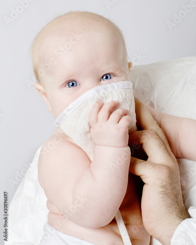 Baby in a medical mask