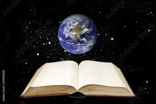 Blank book with the earth in the orion and space area photo