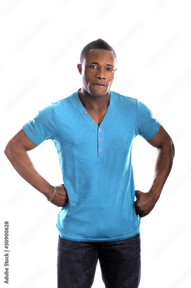 young african man, hands in his hips young african man, hands in his hips