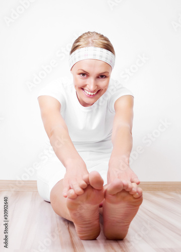 woman stretching the muscles