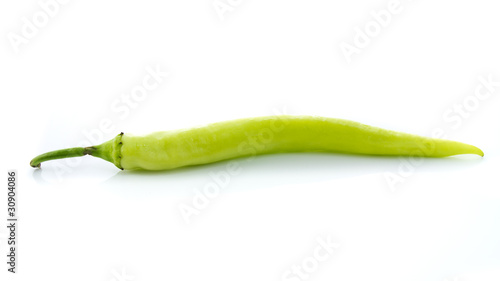 Green chilly on white background
