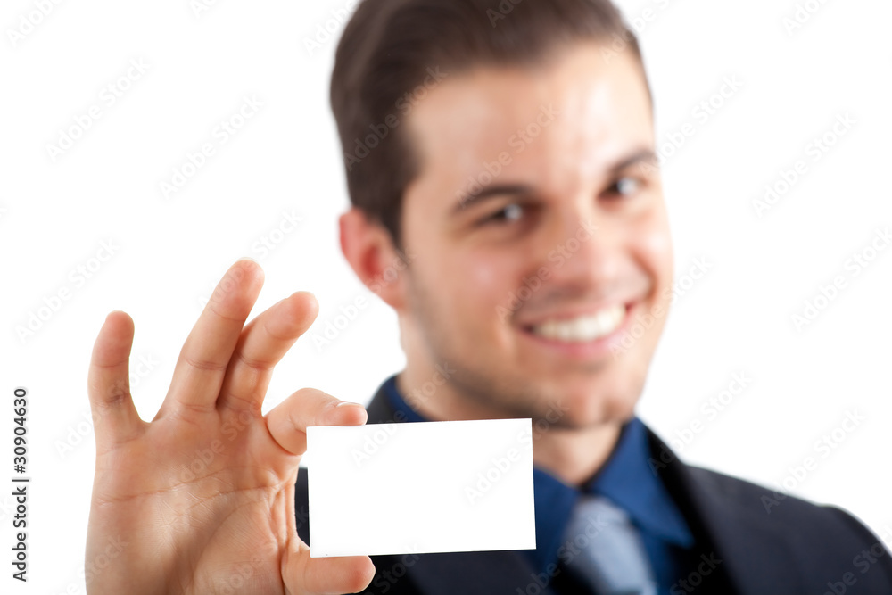 Smiling businessman showing business card Smiling businessman showing business card