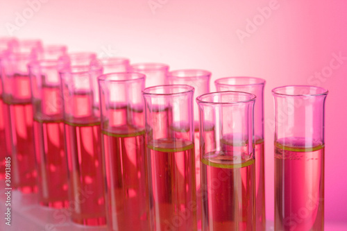 Test-tubes on red background