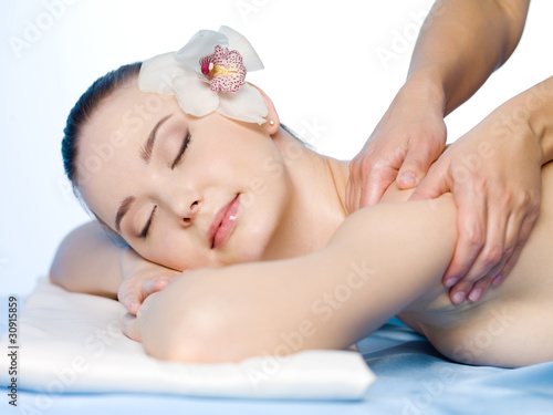 Massage for shoulder of woman