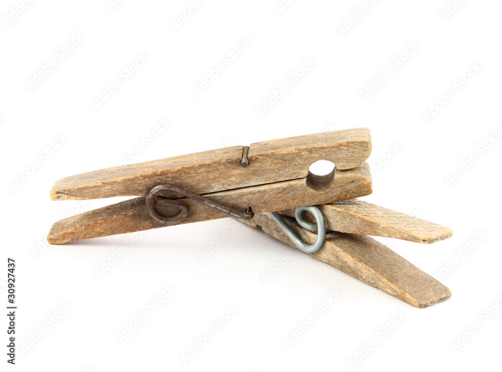 Close up old worn and weathered wooden clothes pins Close up old worn and weathered wooden clothes pins