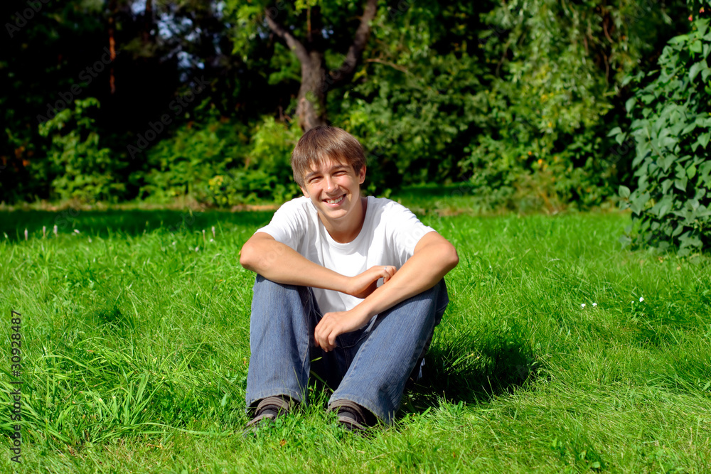 smiling teenager in the summer park