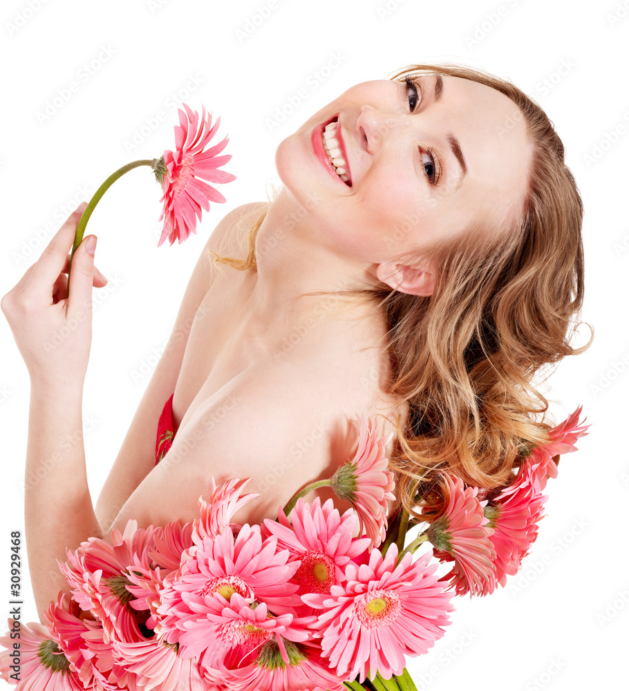 Young woman holding flower.