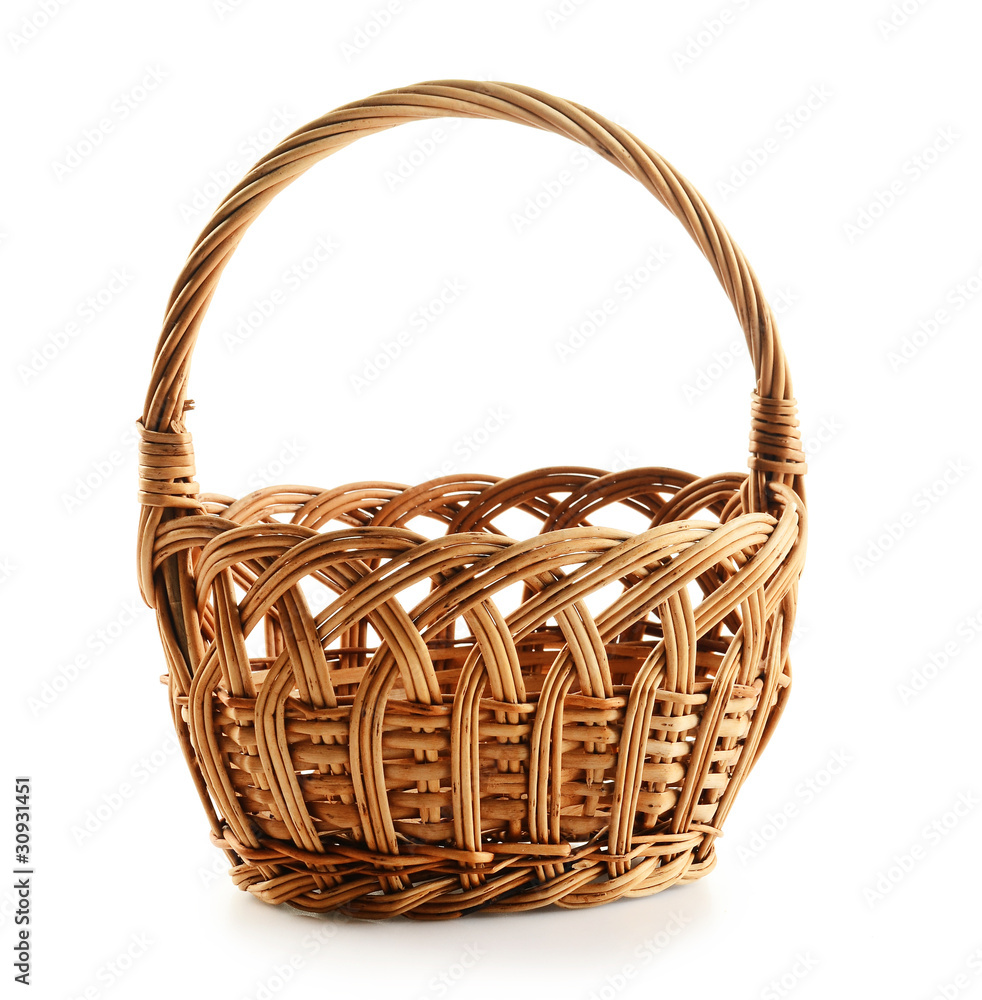 Fototapeta premium Empty wicker basket isolated on white