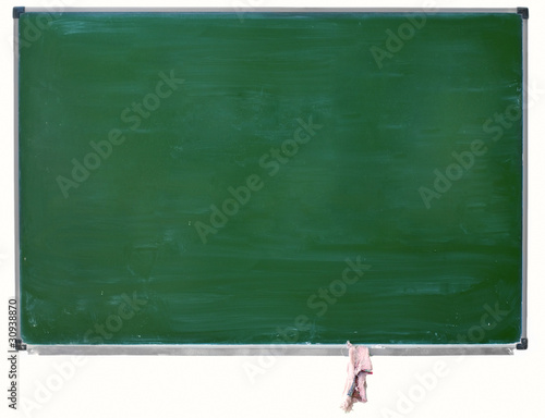 green blackboard with chalk stains and hanging rag isolated
