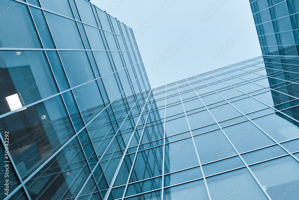 Obraz premium prospective view to new modern building skyscrapers