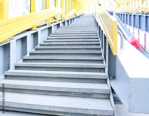 perspective staircase inside yellow corridor © Vladitto