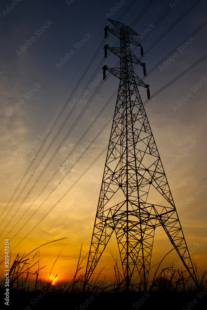 Electric pillar at sunset