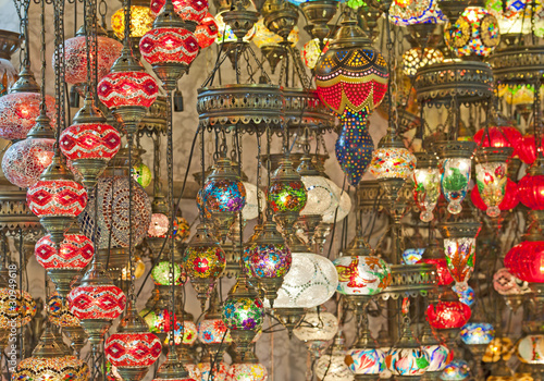 Ornate glass lights at a market stall
