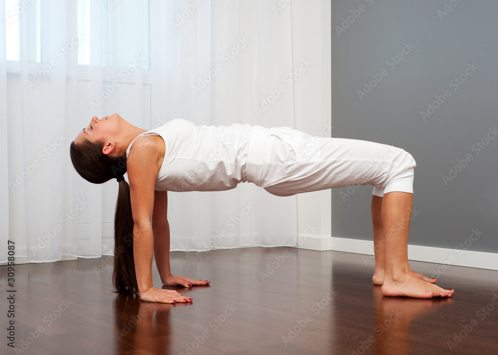 Fototapeta premium woman doing yoga exercise