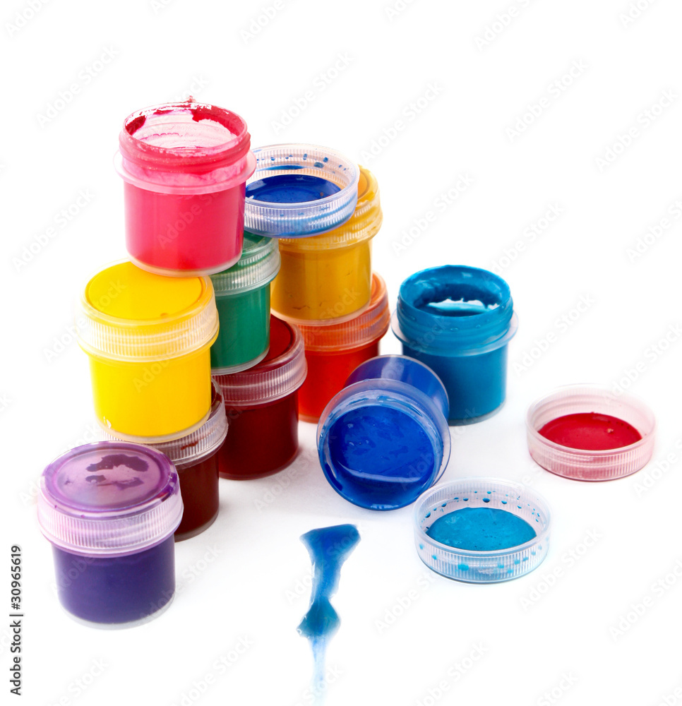 Colorful vibrant cans of gouache isolated on white Colorful vibrant cans of gouache isolated on white