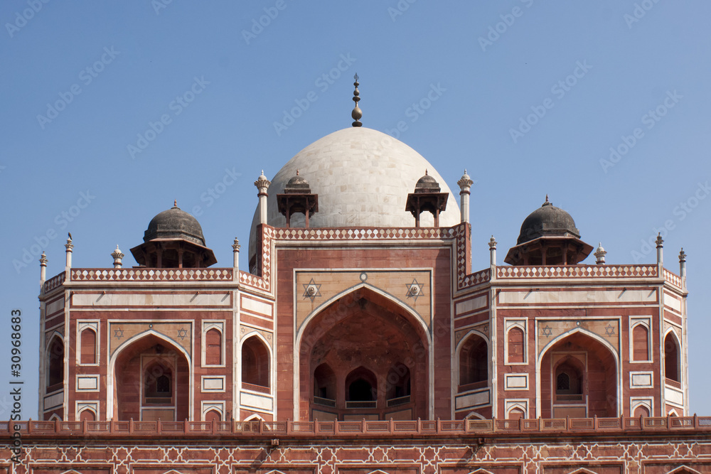 Upper structure of the Humayun tomb peeping over the edge.