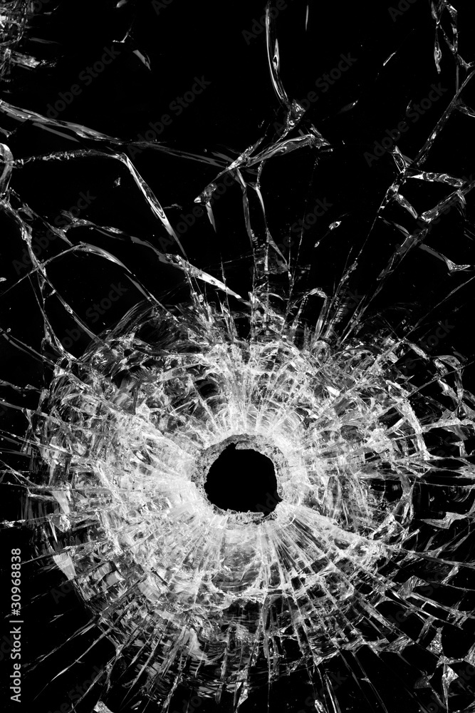 broken glass isolated on black - bullet hole gunshot Stock 写真 | Adobe Stock