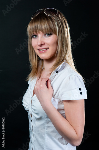Blond girl in shirt and jeans