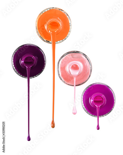 Nail polish pouring out of bottles