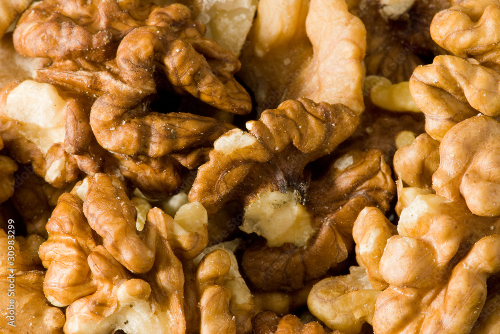 A Closeup photo of walnuts without shells A Closeup photo of walnuts without shells